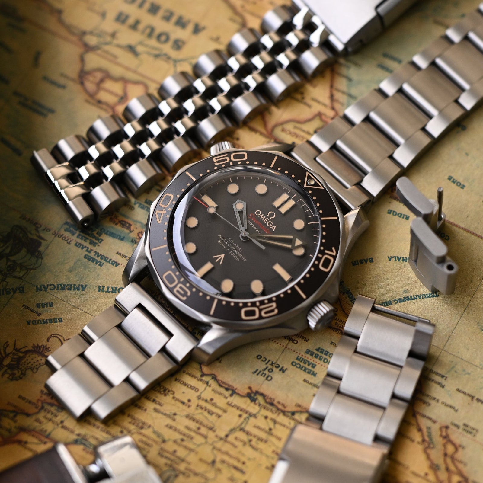 Omega Seamaster Diver 300M Co-Axial Master Chronometer 42mm 007 Edition No Time To Die with multiple premium strap options showcasing versatility